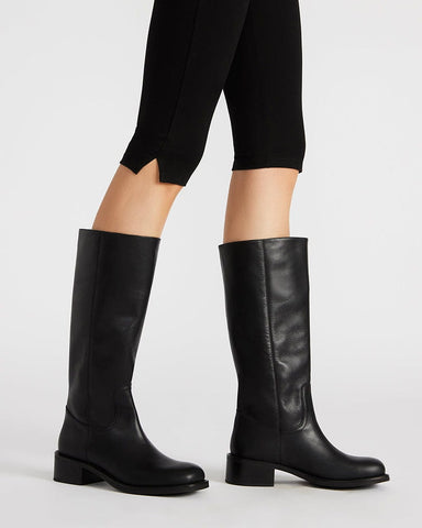 womens-airport-outfit-sophisticated-tall-square-toe-boots