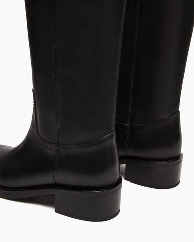 womens-airport-outfit-sophisticated-tall-square-toe-boots