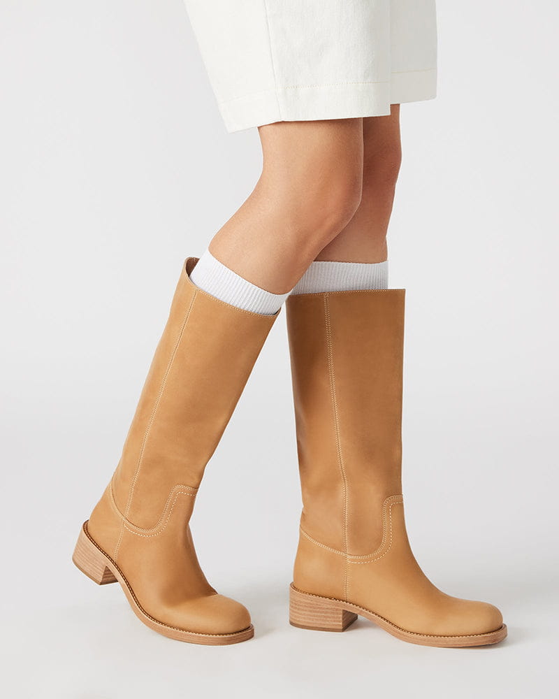 womens-airport-outfit-sophisticated-tall-square-toe-boots
