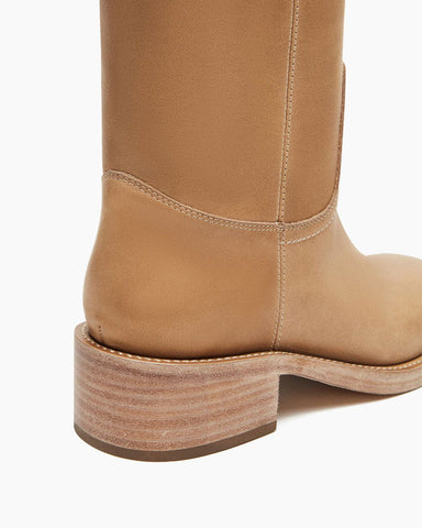 womens-airport-outfit-sophisticated-tall-square-toe-boots