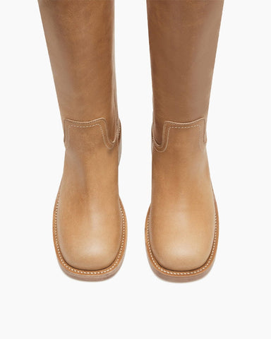 womens-airport-outfit-sophisticated-tall-square-toe-boots