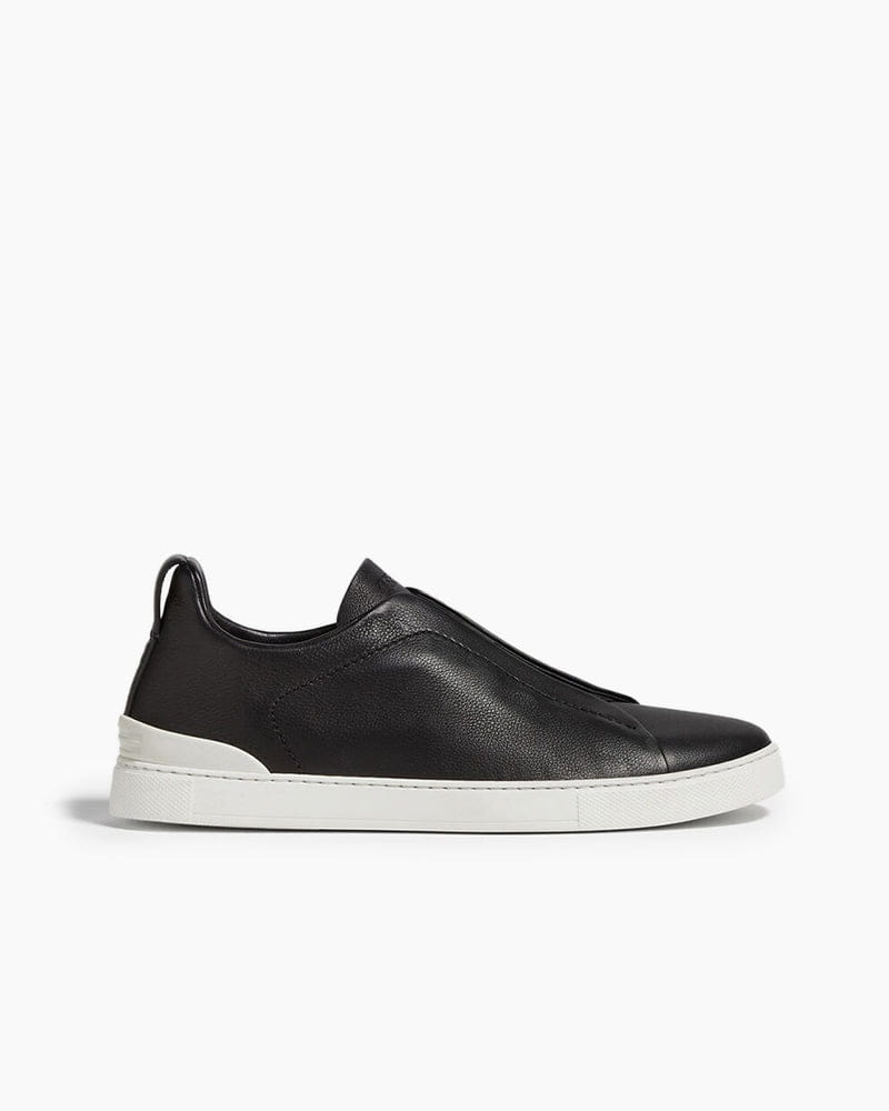 Black Leather Sneakers for First-Class Business Travel